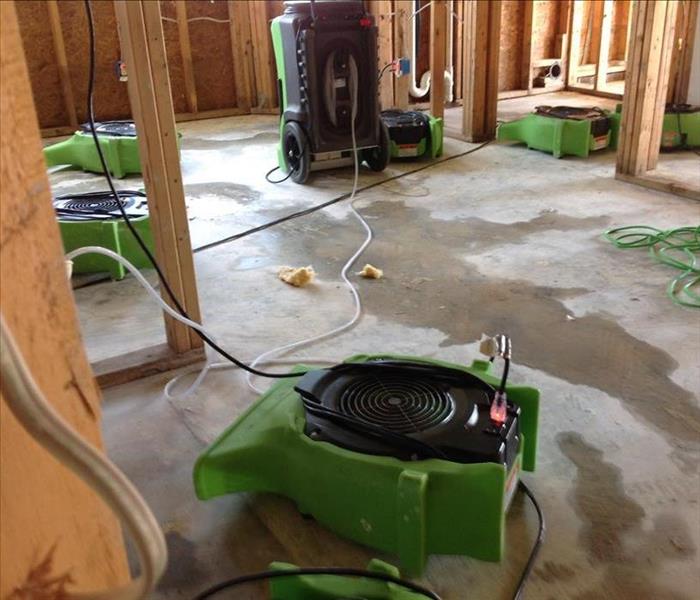 Kitchen area with air scrubbers and dehumidifiers. 