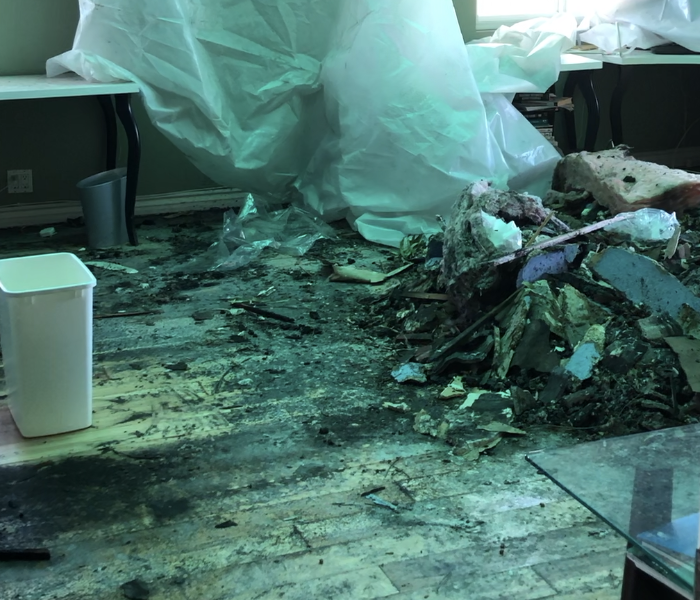 A pile of debris inside a home. 